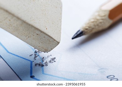 Fix with eraser financial data in document. Concept of banking, financial report and financial audit. - Shutterstock ID 2395061955