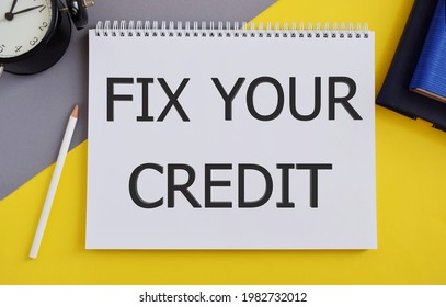 Fix Your Credit text written in Notebook. Conceptual photo Keep balances low on credit cards and other credit