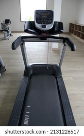 Fixed Bike And Electric Treadmills For Training And Fitness. Exercise Equipment In A Gym Without People, A Space To Exercise And Have A Better Quality Of Life
