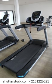 Fixed Bike And Electric Treadmills For Training And Fitness. Exercise Equipment In A Gym Without People, A Space To Exercise And Have A Better Quality Of Life
