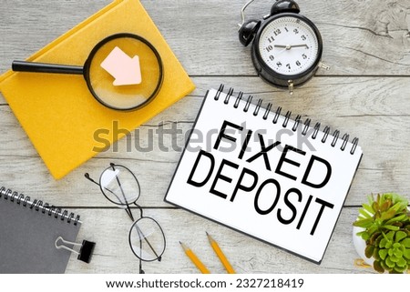 Fixed Deposit workspace with text on notebook