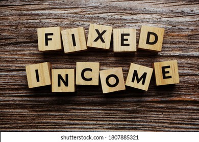 Fixed Income Alphabet Letter On Wooden Background