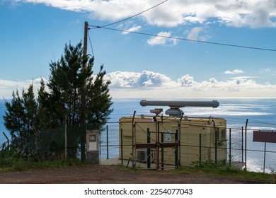 A fixed radar station scans the horizon, the image from Funchal Madeira. - Shutterstock ID 2254077043