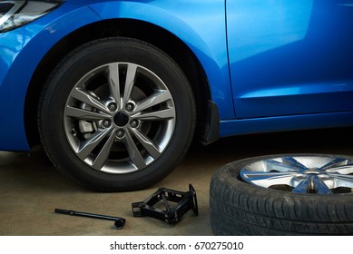 Fixing Broken Car Wheel Service. Car Workshop Close-up