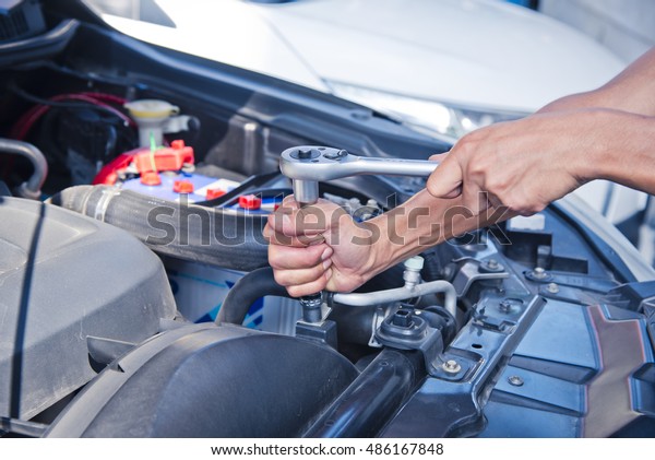 Fixing a\
car, Check the condition of the car\
engine.\
