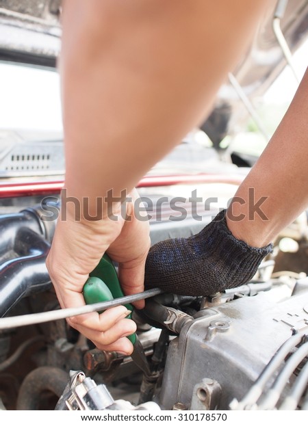 Fixing car hands with\
tools
