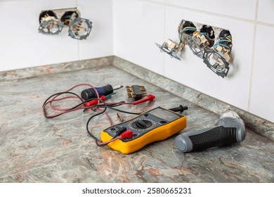 Fixing and repairing broken outlets and socket with tools and ammeter