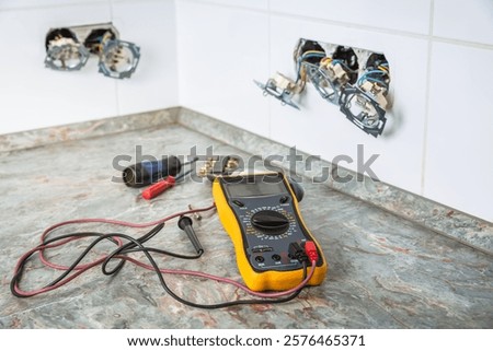 Fixing and reparing broken outlets and socket with tools and ammeter