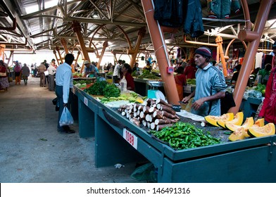 FLACQ, MAURITIUS-JUNE 23: Shopping day at Flacq market which is on Mauritius one of largest vegetable markets June 23, 2013 in Flacq, Mauritius