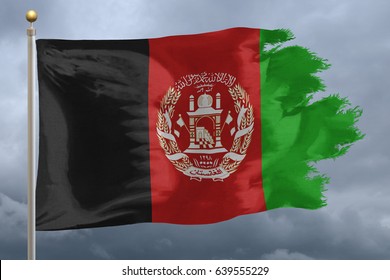 Flag Of Afghanistan With Tattered Edges, Blowing In The Wind In Front Of A Stormy Sky