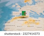 The Flag of Algeria on the World Map.