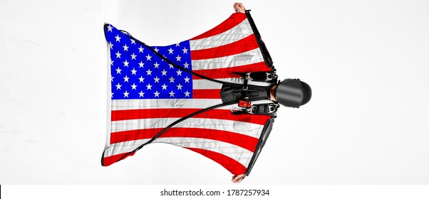 Flag Of America. A Skydiver In A Wing Suit. Skydiving. Extreme Sport.		