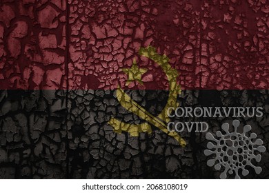 Flag Of Angola On A Old Vintage Metal Rusty Cracked Wall With Text Coronavirus, Covid, And Virus Picture.