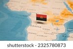 The Flag of Angola on the World Map.
