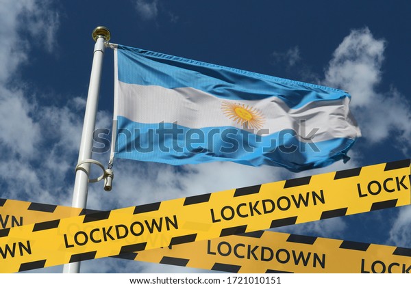 Flag of Argentina against the sky\
and a protective tape with the inscription lockdown. Concept -\
Argentina is quarantined due to the coronavirus\
epidemic.