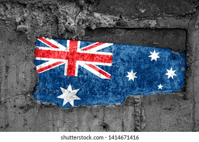 The Flag Of Australia On A Dirty Wooden Surface, Built Into A Concrete Base, With Scuffs And Scratches. Loss Or Destruction Conception.