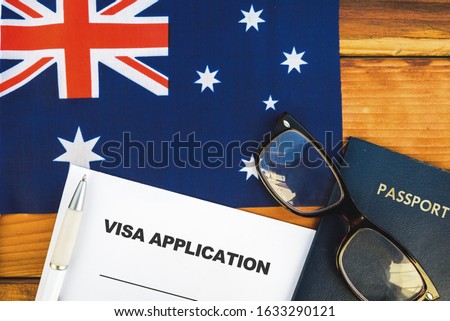 Flag of Australia , visa application form and passport on table