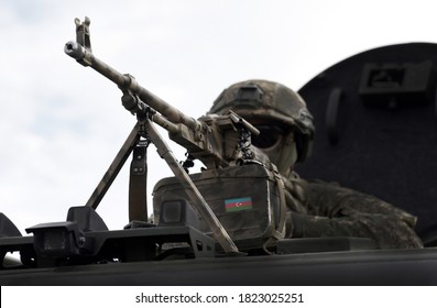 Flag Of Azerbaijan On A Machine Gun. Military Conflict In The Caucasus. Collage. 