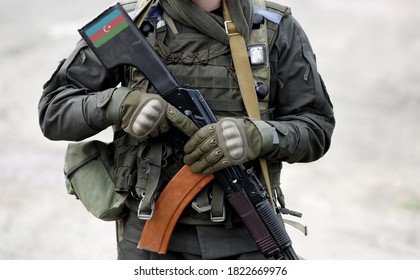 Flag Of Azerbaijan On Submachine Gun Butt. Military Conflict In The Caucasus. Collage. 