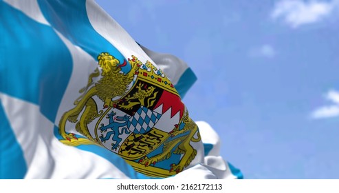 The flag of Bavaria waving in the wind on a clear day. Bavaria is a state in the south-east of Germany