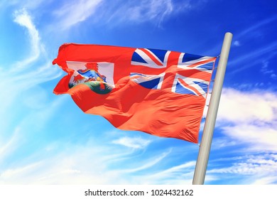 Flag of Bermuda against the background of the blue sky