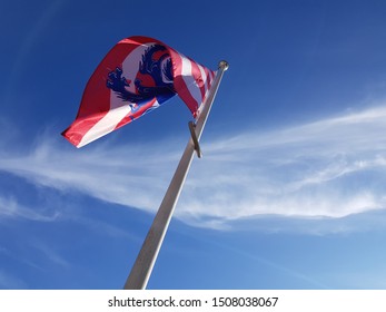 Flag of Bruges - Blue sky with cloud - Bruges, Belgium - Frog's eye view