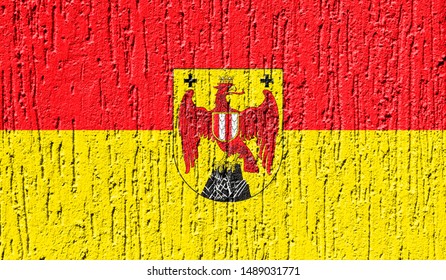 Flag of Burgenland close up painted on a cracked wall