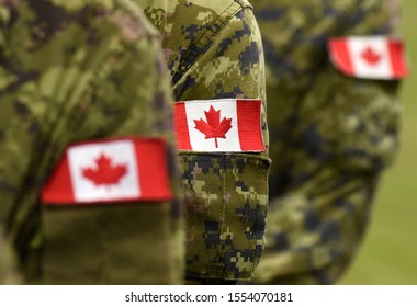 Flag Of Canada On Military Uniform. Canadian Soldiers. Army Of Canada. Remembrance Day. Canada Day.