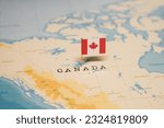 The Flag of Canada on the World Map.