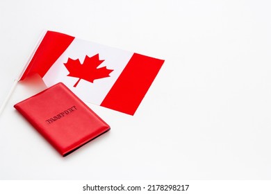 Flag Of Canada With Passport. Travel Visa And Citizenship Concept