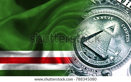 Flag of Chechen Republic of Ichkeria on a fabric with an American dollar close-up.
