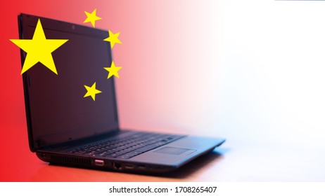 Flag Of China Next To A Laptop. Concept - Chinese Hackers. Hacker Attack From The People's Republic Of China. Notebook Manufacturing In China. Computer Technology. Cyber Attacks. Breaking