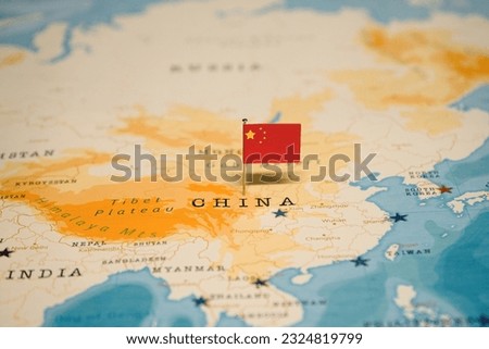The Flag of China on the World Map.