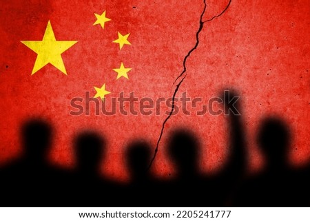 Flag of China painted on a cracked wall. Chinese real estate and debt crisis. Zero covid and lockdown protests in China