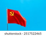 Flag of the Chinese Communist Party on blue background.