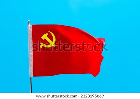 Flag of the Chinese Communist Party on blue background.