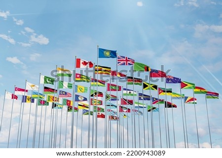 The flag of the Commonwealth of Nations with the flags of the organization's countries along with the flag of Britain