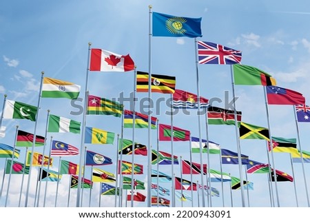 The flag of the Commonwealth of Nations with the flags of the organization's countries along with the flag of Britain