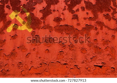 Flag of the Communist party, at the faded and  rusty background. Concept photo