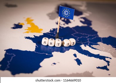 Flag With Copyright Symbol Over A EU Map. Symbolizing The EU Directive On Copyright In The Digital Single Market Or CDSM. Art. 13 Is Known As Meme Ban