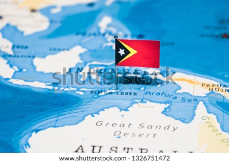 the Flag of East Timor in the world map