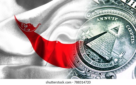 Flag of Easter Island Rapa Nui on a fabric with an American dollar close-up.