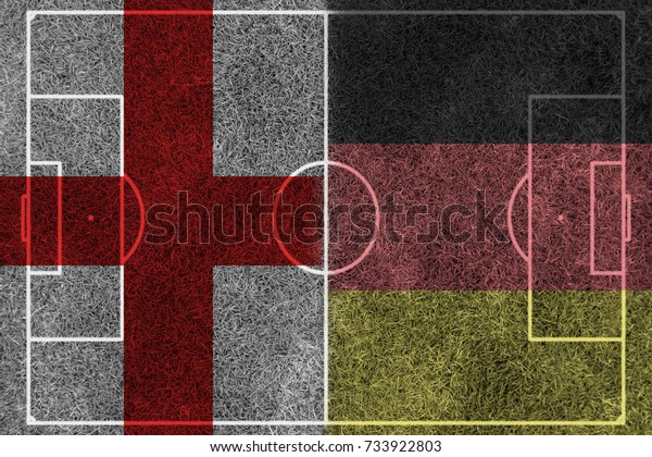 Flag of the England\
and Germany painted on football field divided with middle line ,\
football / soccer match