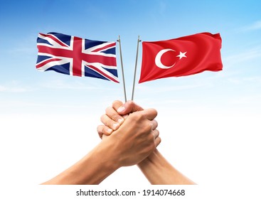 Flag of England and Turkey, allies and friendly countries, unity, togetherness, handshake - Shutterstock ID 1914074668