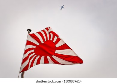 The Flag, Or Ensign, Of The Imperial Japanese Navy Waving In The Wind.