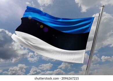 Flag of Estonia on blue sky 