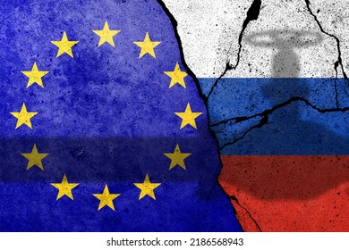 Flag Of Europe Union And Russia Painted On A Concrete Wall With Gas Pipe Shadow. Relationship Between EU And Russia