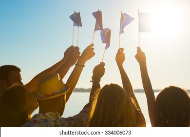 Flag Of Of The European Union. People Waving Flags Of The European Union. Crowd Support Europe. Fans Waving Flags Of The European Union.