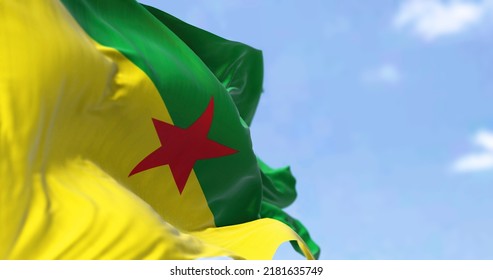 Flag Of French Guiana Waving In The Wind On A Clear Day. French Guiana Is An Overseas Department, Region And Single Territorial Collectivity Of France