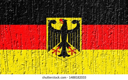 Flag of Germany close up painted on a cracked wall